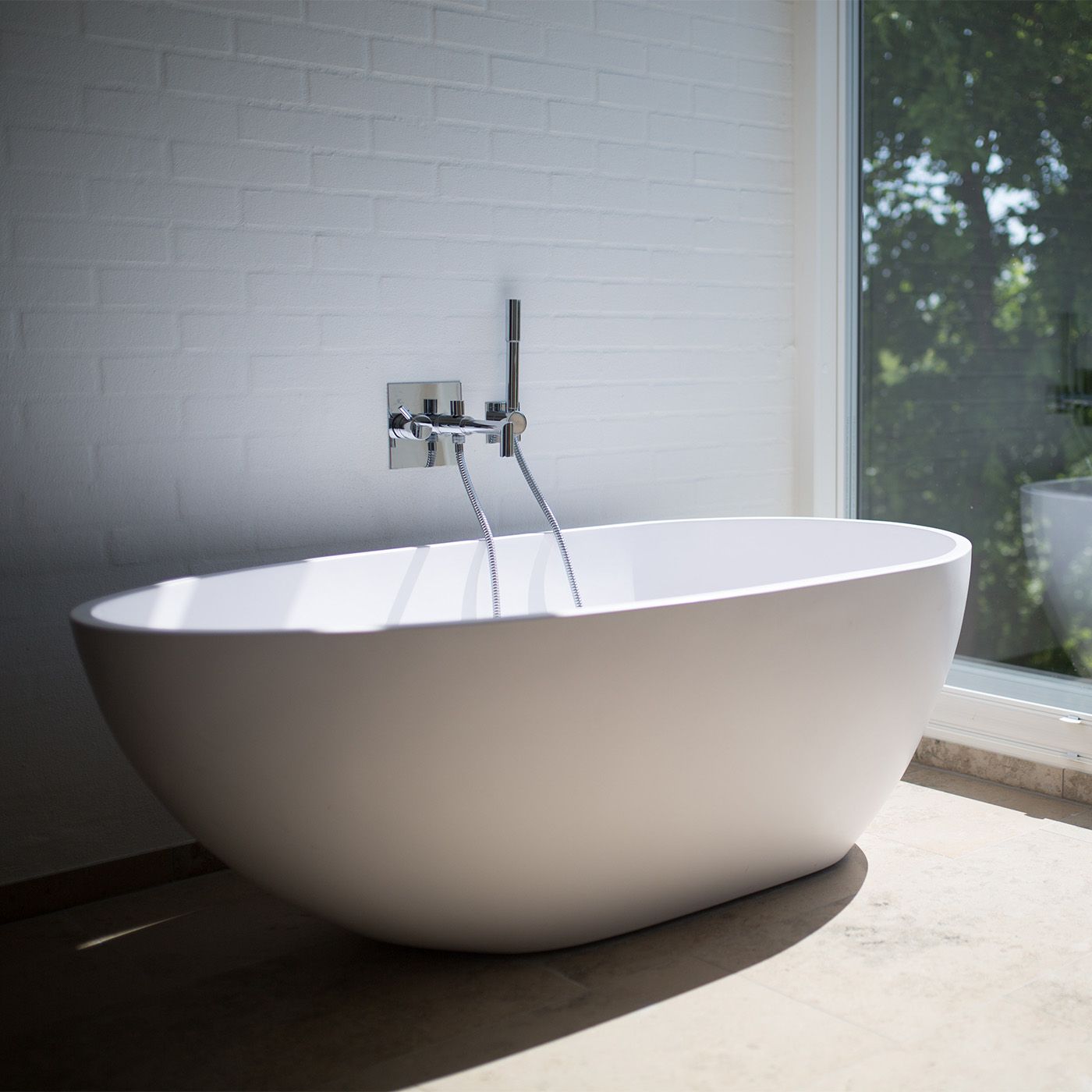 how to install a bathtub on concrete floor